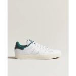 Baskets adidas Originals blanches vintage look casual pour homme 