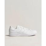 Baskets adidas Originals blanches vintage look casual pour homme 