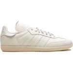 Baskets basses adidas Pharrell Williams blanches en cuir lisse à bouts ronds look casual pour femme 