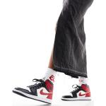Baskets semi-montantes Nike Air Jordan 1 gris foncé en caoutchouc à lacets Pointure 35,5 look casual pour femme 