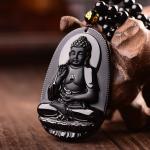 Amulettes noires à motif Bouddha en promo 