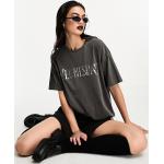 T-shirts à imprimés Asos Design noirs La Famille Addams Mercredi Addams à manches courtes Taille XS pour femme en promo 