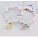 Bracelets de perles pour baptême roses en or rose à perles look fashion pour femme 