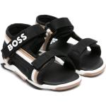 Sandales plates de créateur HUGO BOSS BOSS Kidswear noires en caoutchouc à bouts ouverts à scratchs Pointure 23 pour garçon 