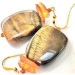 Boucles d'oreilles argentées en argent à perles à motif tigres en argent en ambre pour femme 