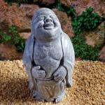 Statuettes grises en béton à motif Bouddha 