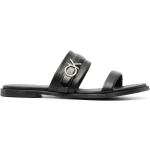 Sandales plates de créateur Calvin Klein noires en cuir de veau à bouts ouverts Pointure 41 pour femme en promo 