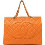 Sacs à main de créateur Chanel orange en cuir en cuir seconde main rectangulaires look fashion pour femme 