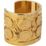 Bracelets de créateur Chanel jaunes en métal seconde main look fashion pour femme 