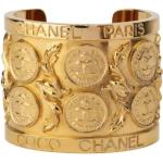 Bracelets de créateur Chanel jaunes en métal seconde main look fashion pour femme 