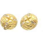Boucles d'oreilles de créateur Chanel jaunes en métal seconde main look vintage 