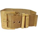 Bracelets de créateur Chanel jaunes en métal seconde main look vintage 