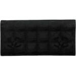 Portefeuilles de créateur Chanel noirs en cuir en cuir seconde main look vintage pour femme 