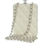 Besaces vintage de créateur Chanel blanches en cuir seconde main look vintage pour femme 