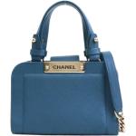 Sacs à main de créateur Chanel bleu marine en cuir en cuir seconde main look fashion pour femme 