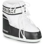 Chaussures de golf d'hiver Moon Boot blanches look fashion 