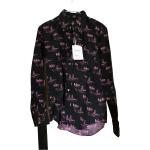 Chemises Comme des Garçons noires en coton Beatles seconde main pour garçon en solde de la boutique en ligne Vestiairecollective 