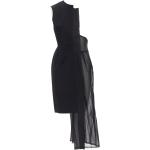 Robes Comme des Garçons noires seconde main look fashion pour fille de la boutique en ligne Vestiairecollective 