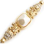 Broches en or de créateur Dior beiges en plaqué Or à perles seconde main look vintage pour femme 