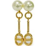 Boucles d'oreilles pendantes de créateur Dior jaunes en métal seconde main look vintage pour femme 