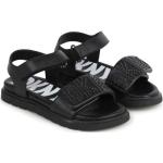 Sandales plates de créateur DKNY noires en caoutchouc à clous à bouts ouverts à scratchs Pointure 38 