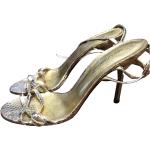 Sandales à brides de créateur Dolce & Gabbana Dolce dorées à effet crocodile seconde main Pointure 37,5 pour femme en promo 