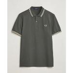 Polos Fred Perry Twin Tipped verts pour homme 