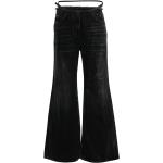Jeans évasés de créateur Givenchy noirs en denim à franges W25 L28 pour femme 