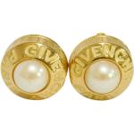 Boucles d'oreilles à clip de créateur Givenchy jaunes en métal seconde main look fashion pour femme 