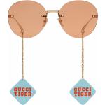 Gucci Eyewear lunettes de soleil à monture ronde - Or