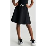 Jupes en jean Calvin Klein noires à logo en éponge de créateur Taille 8 ans pour fille de la boutique en ligne Calvinklein.fr 