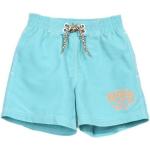 Shorts de bain turquoise look fashion pour garçon de la boutique en ligne Rakuten.com 