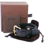 Bracelets de créateur Louis Vuitton noirs en cuir en cuir seconde main look vintage 