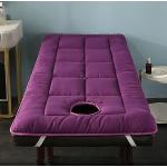 Tables de massage violettes à rayures inspirations zen 