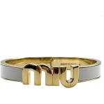 Bracelets en jonc de créateur Miu Miu jaunes en métal seconde main look chic pour femme 