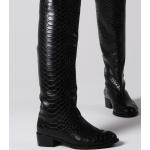 Bottes noires en fausse fourrure pour pieds larges à fermetures éclair avec un talon entre 3 et 5cm look fashion pour femme 