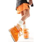 Moon boots Moon Boot orange en caoutchouc à talons chunky à bouts ronds à lacets Pointure 39 pour femme 