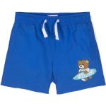 Shorts de bain Moschino bleus à motif ours de créateur Taille 10 ans pour garçon de la boutique en ligne Miinto.fr avec livraison gratuite 