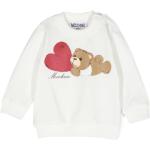 Sweatshirts Moschino blancs en peluche à motif ours de créateur Taille 9 ans pour fille de la boutique en ligne Miinto.fr avec livraison gratuite 