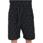 Shorts de créateur Moschino noirs all Over en éponge Taille XL look casual pour homme 