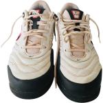 Baskets basses Nike blanches en cuir seconde main Pointure 43 look casual pour homme en promo 