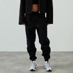 Joggings Nike Tech Fleece noirs en polaire Taille S look sportif pour femme 