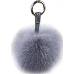 Porte-clés gris clair en fourrure à pompons en cuir look fashion 