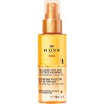 Crèmes solaires Nuxe Sun bio d'origine française à l'huile de jojoba 100 ml réparatrices pour tous types de cheveux texture lait pour femme 
