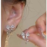 Boucles d'oreilles pendantes argentées en cristal à motif papillons look fashion pour femme 