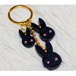 Porte-clés noirs en résine à strass à motif lapins 