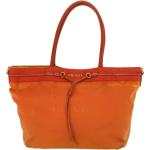 Besaces vintage de créateur Prada orange en tissu seconde main look fashion pour femme 