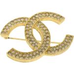 Broches de créateur Chanel jaunes en métal seconde main look vintage pour femme 
