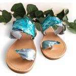 Sandales plates turquoise en cuir avec un talon jusqu'à 3cm pour femme 