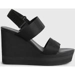 Sandales de créateur Calvin Klein noires à logo en cuir synthétique en cuir éco-responsable Pointure 36 avec un talon de plus de 9cm pour femme 